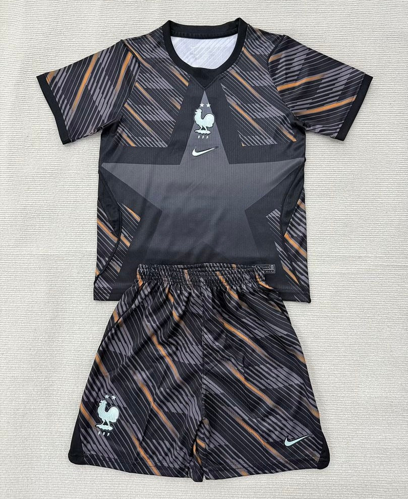 KIT NIÑO FRANCIA 2026 1A EQUIPACION PORTERO NEGRO